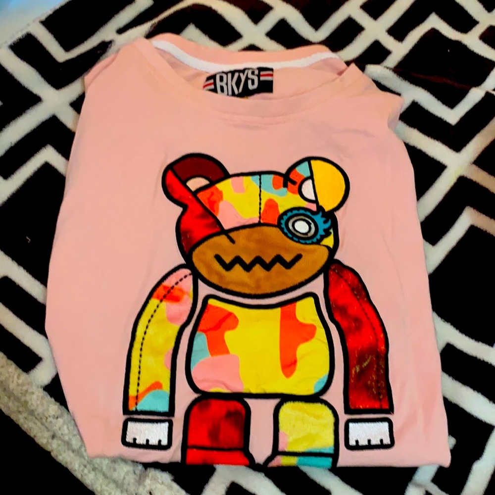 I’m selling a BKYS shirt. In the color pink and it’s only been worn once.